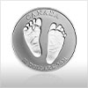 Image of Silver Welcome to the World Coin featuring two baby footprints